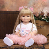 KEIUMI blonde reborn toddler doll smiling, wearing pink cat outfit and headband.