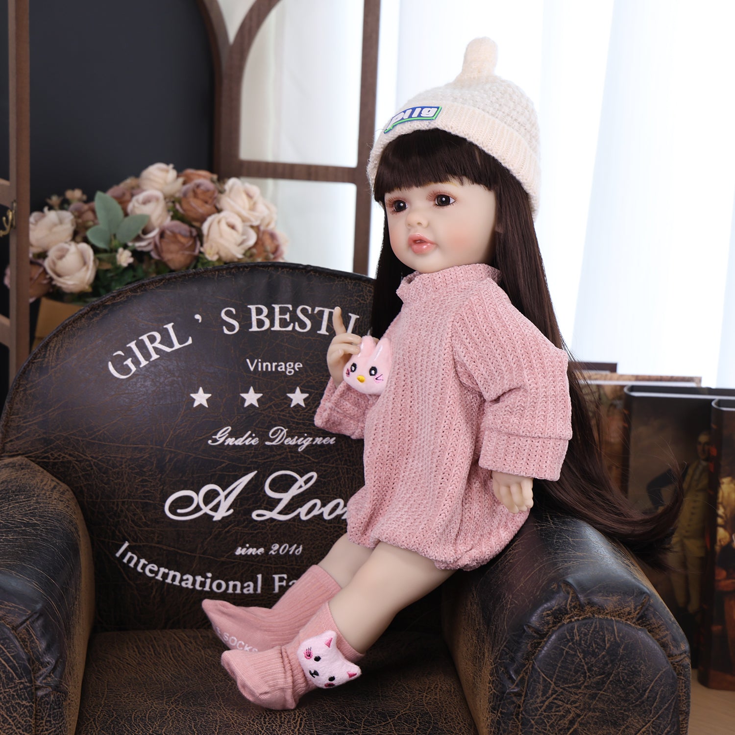 Elara reborn doll with pink magnetic pacifier and matching bunny clip.