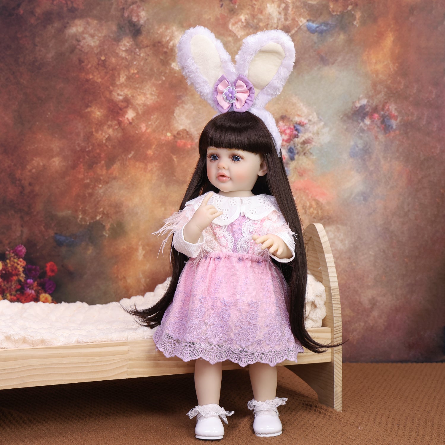 KEIUMI Primrose porcelain reborn doll with bunny ears, full body view.