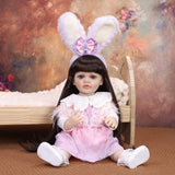 Side view of KEIUMI Primrose doll's long dark hair and bunny ears.