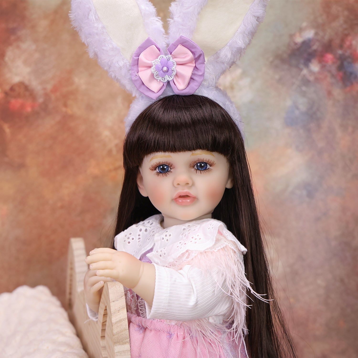 KEIUMI Primrose doll in a playful pose, highlighting her full ensemble.