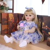 Close-up of KEIUMI Cherish doll's hand-painted face and realistic eyes.