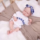 Side profile of the sleeping reborn doll, showing its gentle facial features.
