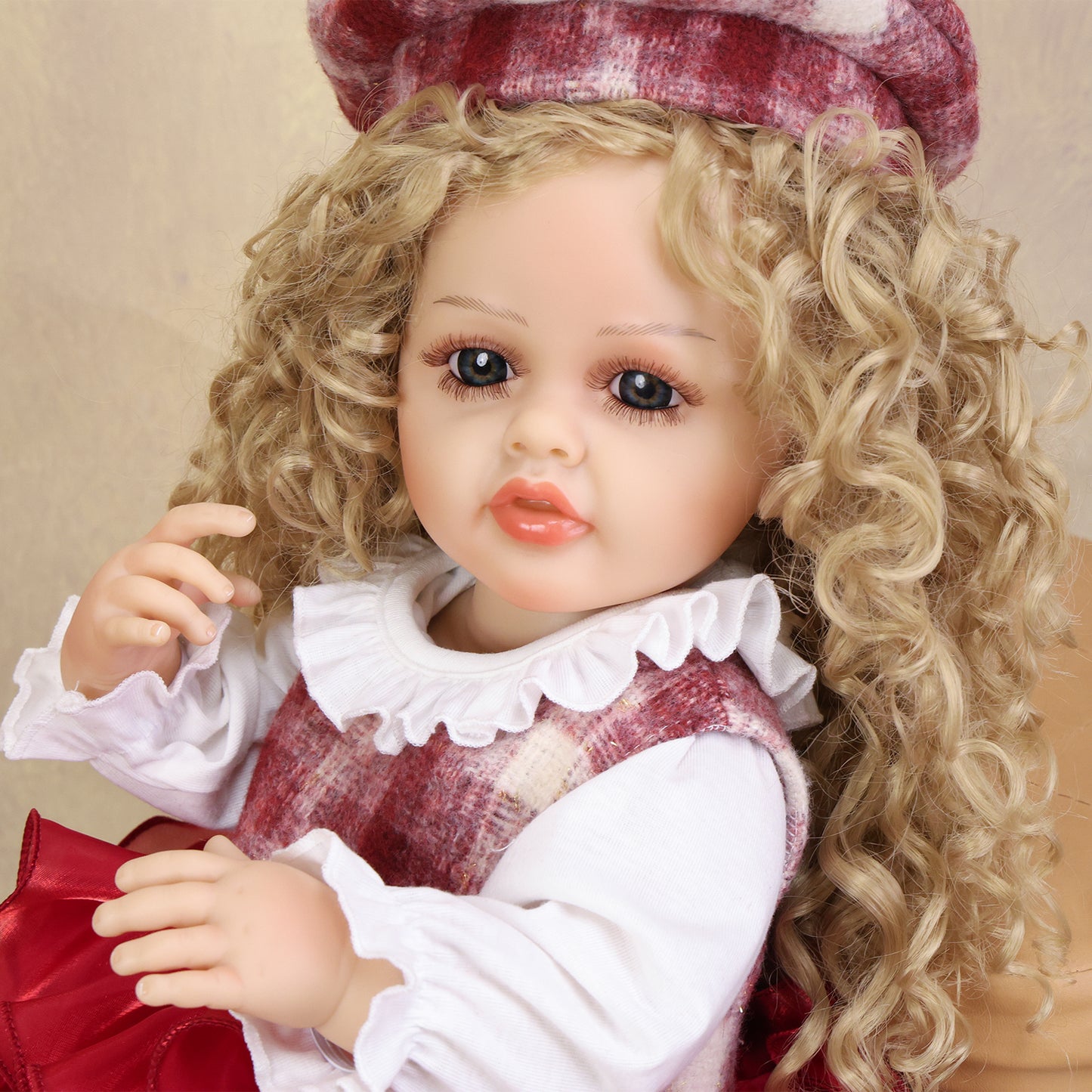 Full body view of KEIUMI Belle, showcasing her ruffled outfit and white shoes.