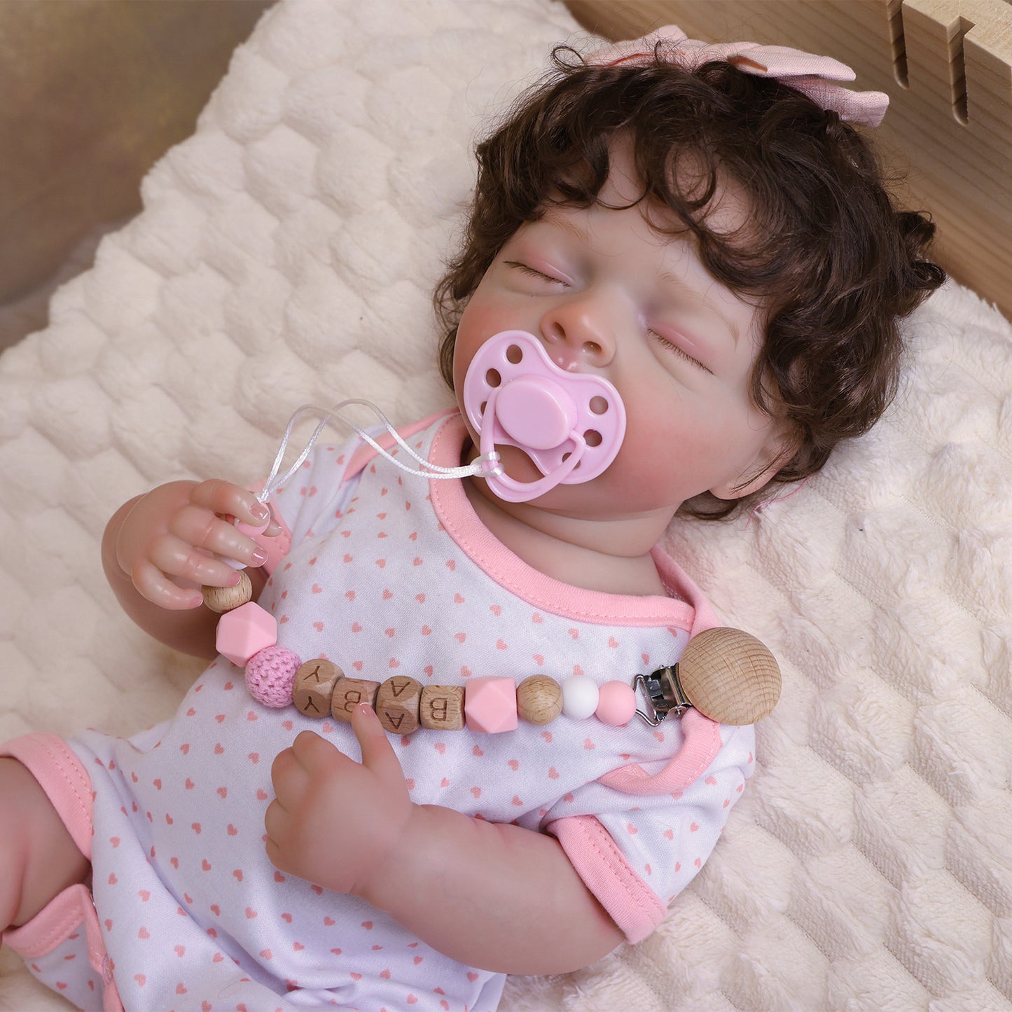 Close-up of Rosalie's serene sleeping face, dark brown curly hair, realistic skin.