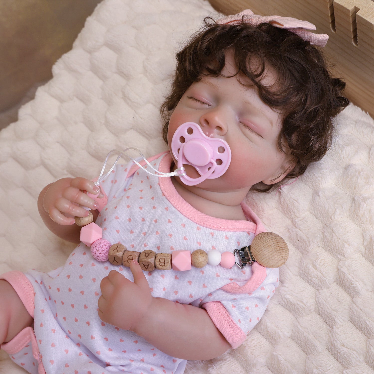 Close-up of Rosalie's serene sleeping face, dark brown curly hair, realistic skin.
