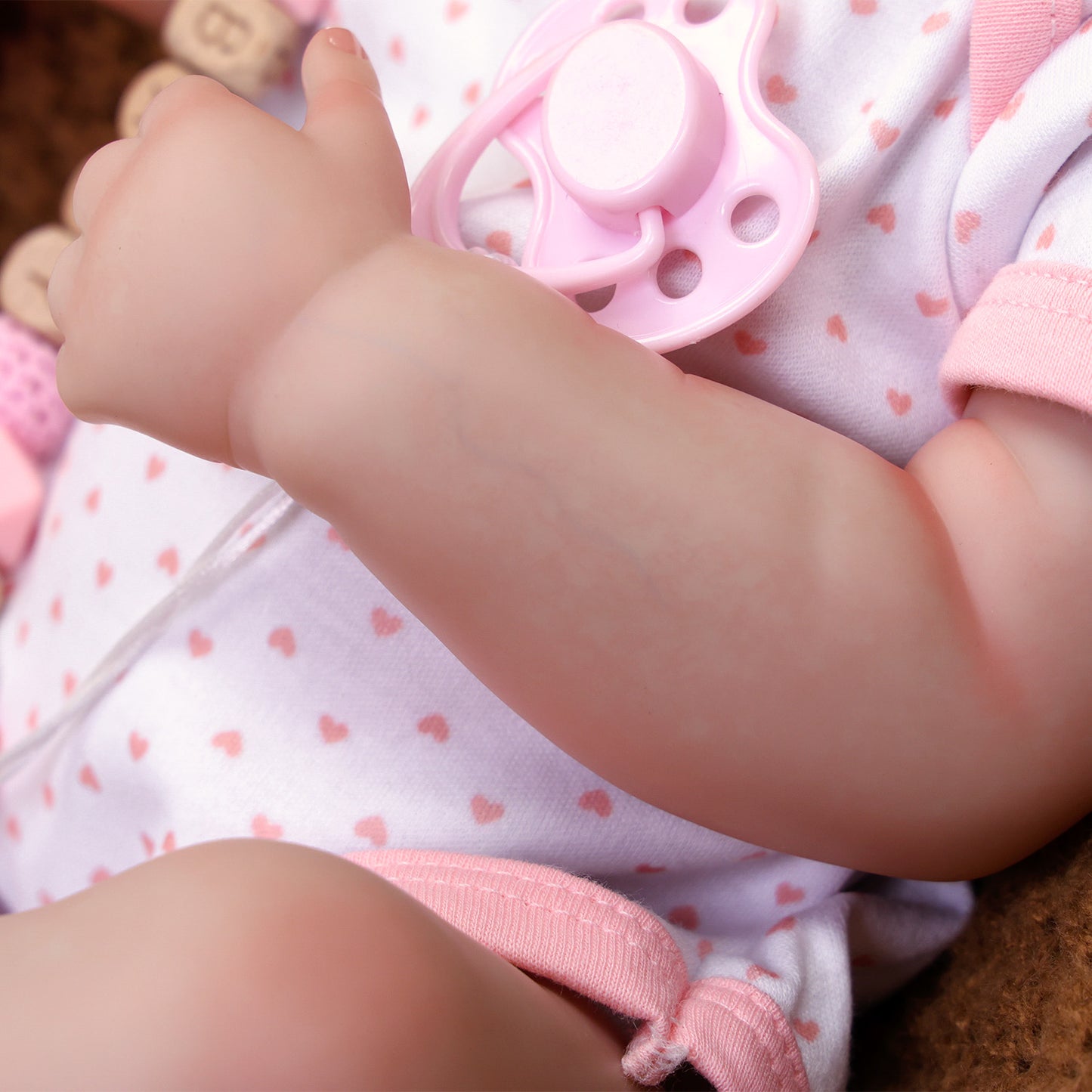 Side profile of Rosalie's head, highlighting her lifelike features and soft hair.