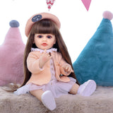KEIUMI Cora 22" Vinyl Reborn Toddler Doll, Peach Cardigan Outfit