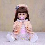 KEIUMI Cora 22" Vinyl Reborn Toddler Doll, Peach Cardigan Outfit