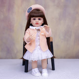 KEIUMI Cora 22" Vinyl Reborn Toddler Doll, Peach Cardigan Outfit