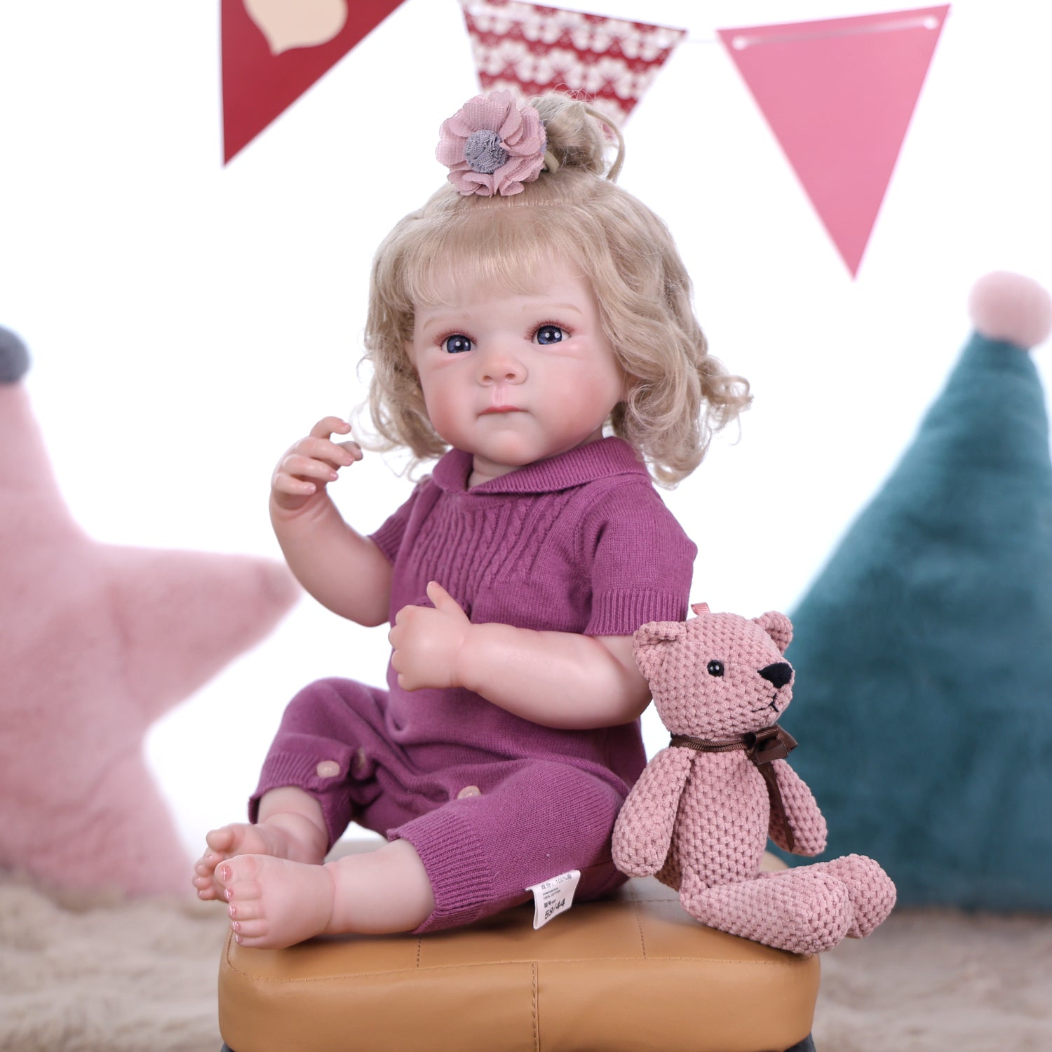 Close-up of Willow doll's soft, hand-rooted blonde hair.