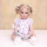 Close-up of Pippa's thoughtful face, showing blue eyes and blonde pigtails.