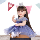 Aurora reborn doll with her long brown hair cascading over her shoulders.