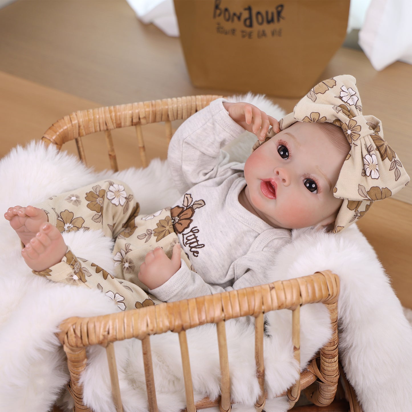 KEIUMI Winnie Newborn Soft Touch Vinyl Reborn Baby Doll, Wide Curious Eyes, Charming Floral Outfit